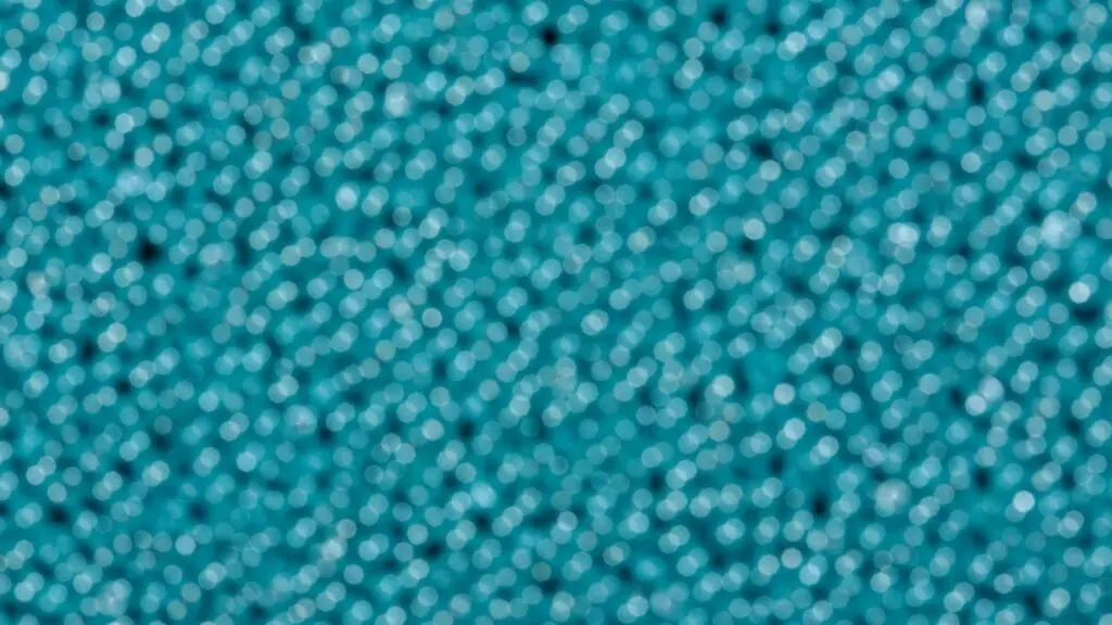 Close-up of tightly packed teal beads